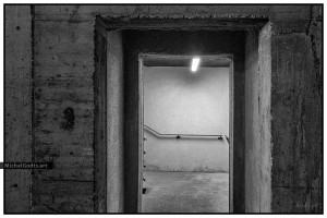 Ominous Stairwell Entrance :: Black and white fine art photograph - Artwork © Michel Godts