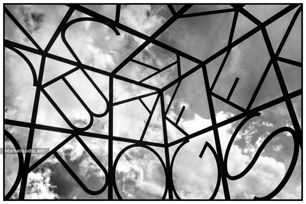 Alphabet Cube—Black and white photography of public art.  - Artwork © Michel Godts
