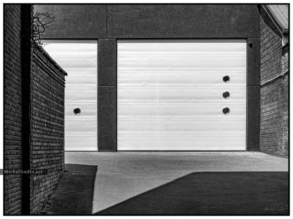 Garage Doors Geometries :: Black and white fine art photography print - Artwork © Michel Godts