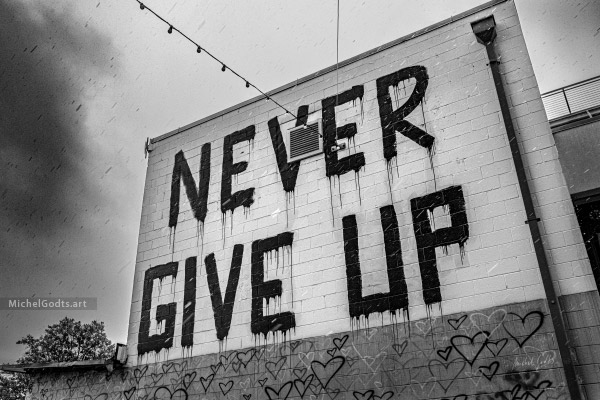 Never Give Up :: Black and white urban fine art photograph - Artwork © Michel Godts