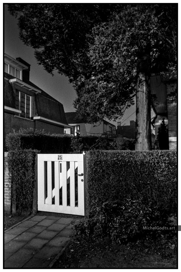 Nighttime In Stockel—Gate :: Black and white fine art photography print - Artwork © Michel Godts